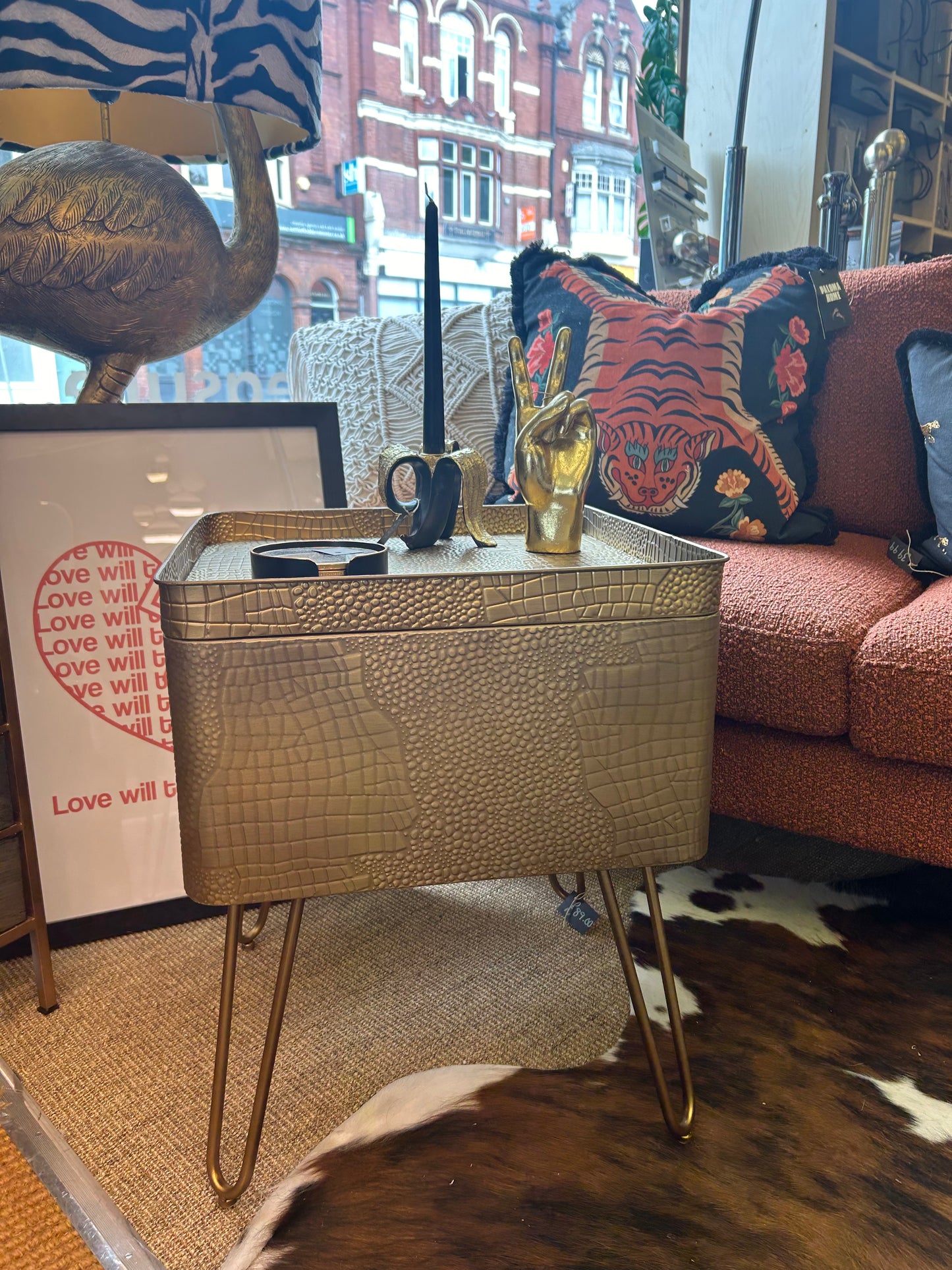 Golden side table with storage