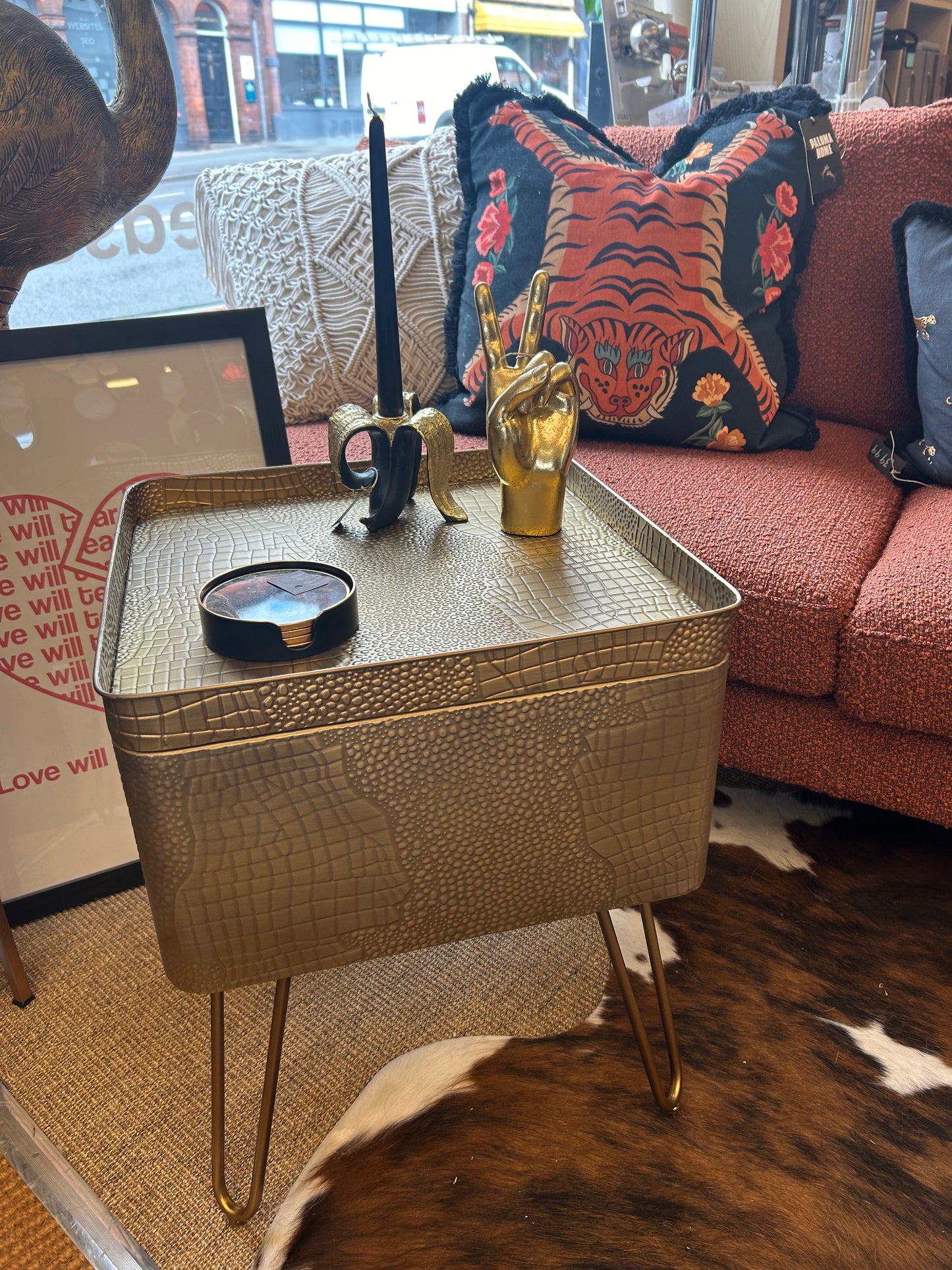 Golden side table with storage