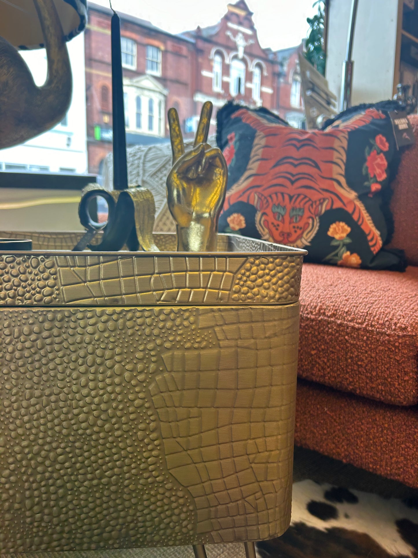 Golden side table with storage