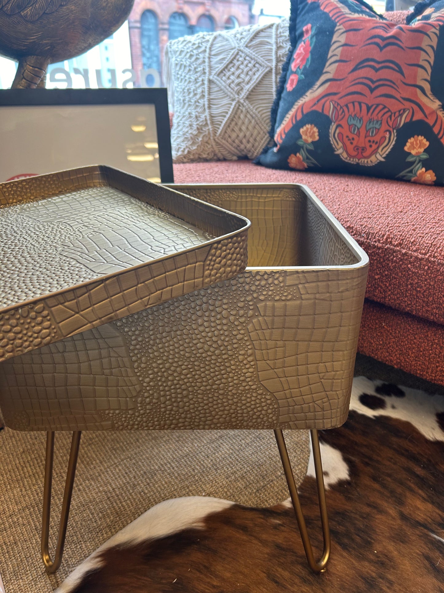 Golden side table with storage