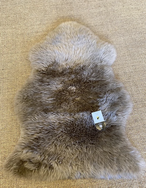 Light beige sheepskin rug