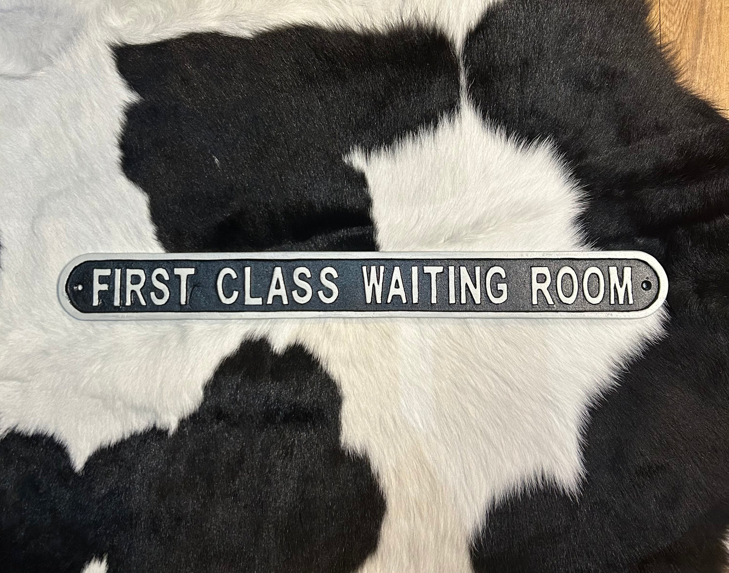 First class waiting room sign
