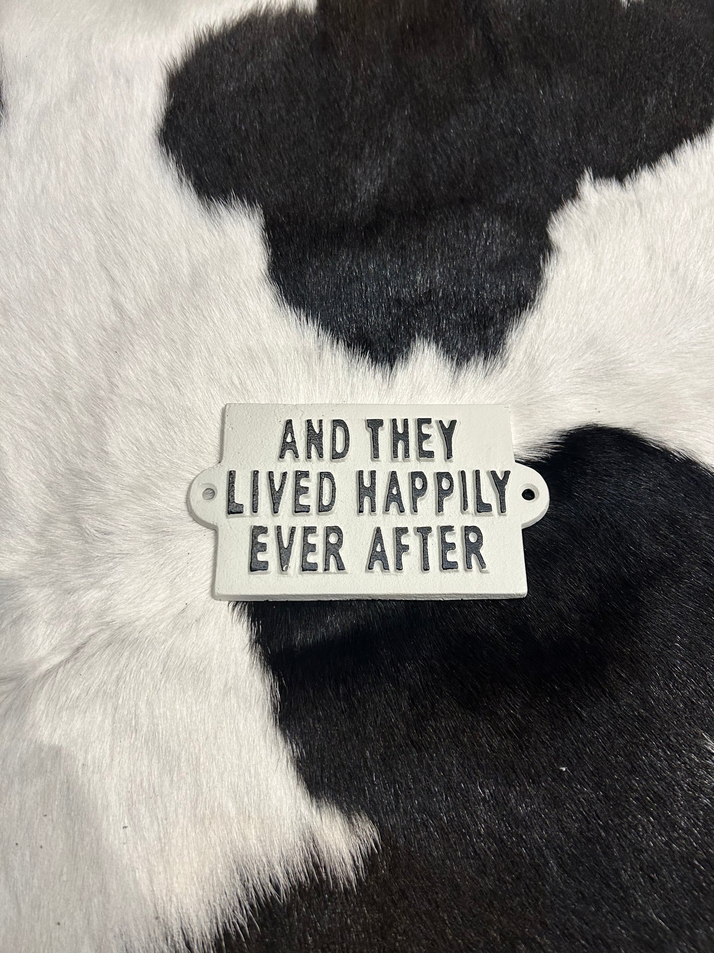 White 'Happily ever after' sign.