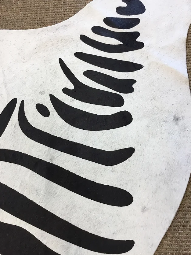 Black and off-white Zebra printed cow hide