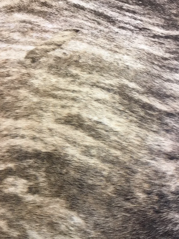 Brown and Cream speckled cow hide