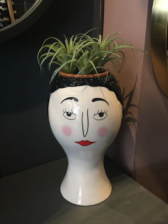 Faux succulent plant in terracotta pot